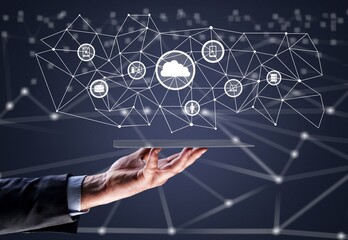 Man holding business elements icons on the screen