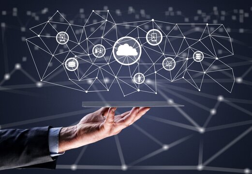 Man holding business elements icons on the screen