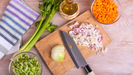 Cooking vegetable filling of onions carrots and celery, chopped ingredients for Mirepoix or...