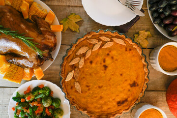 Thanksgiving Day. Thanksgiving Day Autumn background of pie and chicken. Thanksgiving dinner.