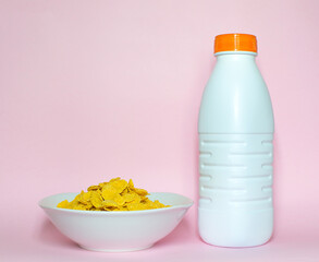 corn flakes and milk in a bottle