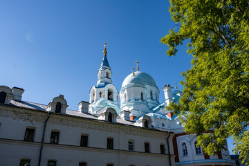 Obraz premium summer views of architectural ancient buildings on the pilgrim island on Lake Ladoga