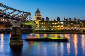 Fototapeta na wymiar St Paul's Cathedral and the Millennium Bridge in London at night
