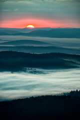 Fototapeta premium Sunrise over the mountain forest. Bieszczady National Park. Carpathian Mountains. Poland.