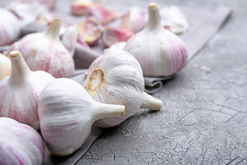 Fresh garlic on grey background
