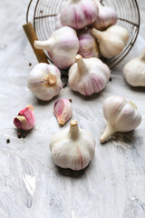 Fresh garlic on grey background
