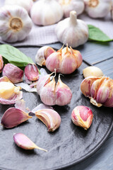 Fresh garlic on wooden background