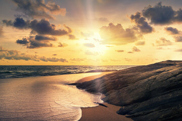 Fototapeta na wymiar Tropical bright sunset of the beach of Indian Ocean