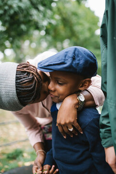 Affectionate mother and son together outdoors