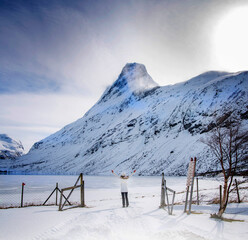 Norway - Girl gazing at beautiful mountain inn Møre og Romsdal