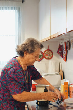 84 year old woman in her kitchen