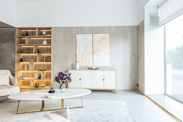 modern interior design of the living area in the studio apartment in warm soft colors. decorative...