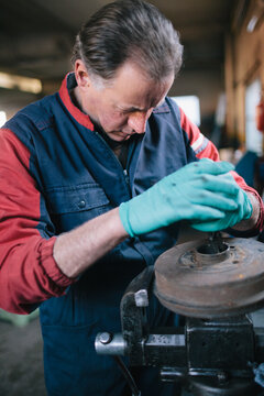 Mechanic working in auto repair shop