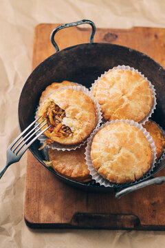 Fresh homemade mince pies in a cast iron dish