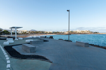 Coastal promenade along the ocean in the spa town of Costa Teguise, Lanzarote, Canary Islands