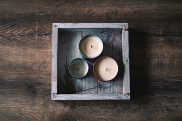 Above view of candles on a wooden table