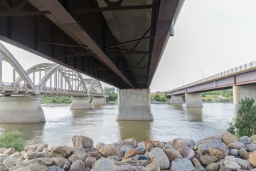 a view of three bridges from under neath