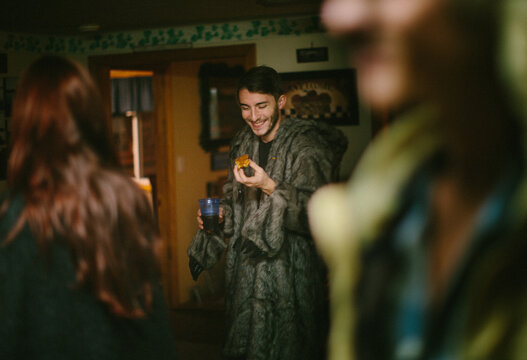 A group of friends celebrate the holidays with a big feast fit for a king