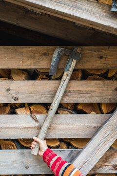 Hand holding axe