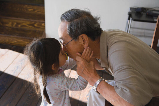 Grandfather and Grandchild Sharing a Special Moment