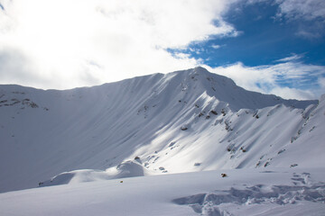 Fototapeta na wymiar Mountain in Winter covered with snow