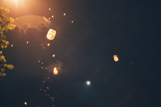Festival time - sky lanterns flying away
