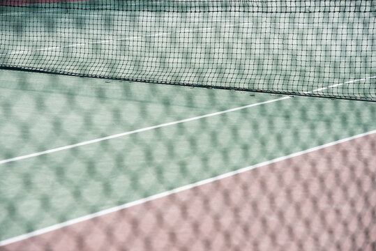 Close Up of Net and Floor of Tennis Court