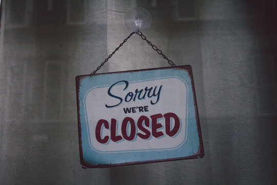 Sign in front of the store said ""Sorry we're closed""