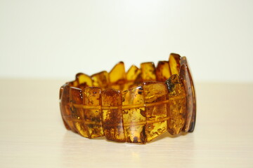 natural amber bracelet on the table close up