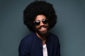 Beautiful afro man in front of a background