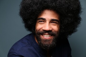 Beautiful afro man in front of a background