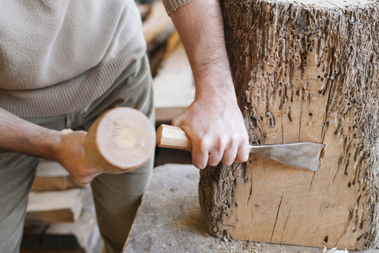 Woodworker using chisel