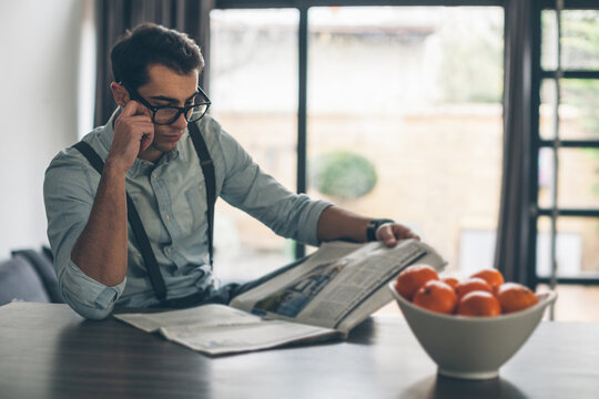 Stylish Man Reading Newspaper
