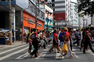 salvador, bahia / brazil - january 23, 2013: people are seen crossing the street in a pedestrian...