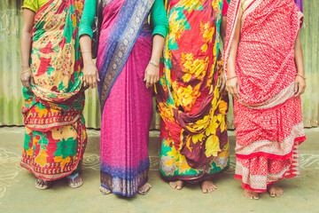 Four Woman Dressed in Saris