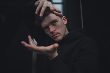 
Feather in a black hoodie