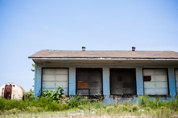 abandoned blue building against blue sky