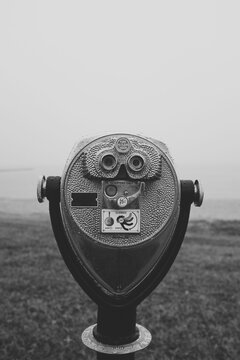 Binocular telescope camera on a foggy beach during the winter months in Maryland