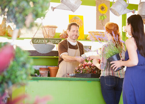 Nursery: Customer Paying for Flower Purchase