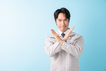 ビジネスマン　作業服　拒否