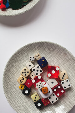 close up of vintage dice arranged in a dish