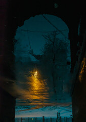 Fototapeta na wymiar reflections on wet road night city landscape