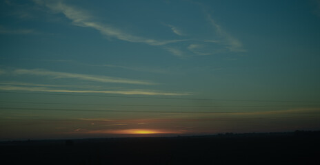 Obraz premium clouds over sunset