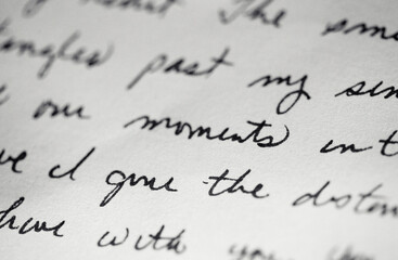 A letter written in cursive - focus on the word moments