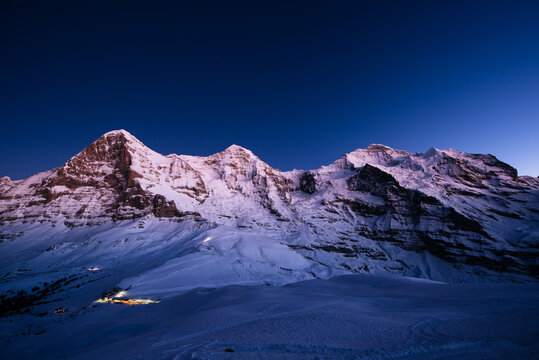Eiger, M&Ocirc;&oslash;&Omega;_nch and Jungfrau at dusk