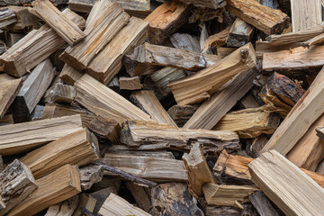 pile of split firewood not stacked