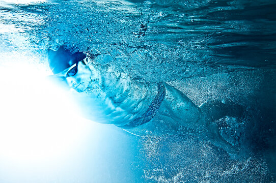 Underwater Muscular Competative Swimmer Freestyle