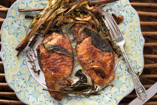 Grilled Pork Chops in Pan with Grilled Green Onions