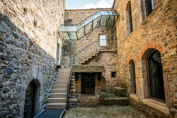 Fototapeta na wymiar Courtyard and entrance of museum in middle of Montebello castle church in Bellinzona Switzerland