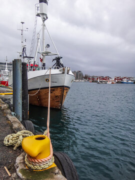 Whaling ship docked in a scandinavian seaport